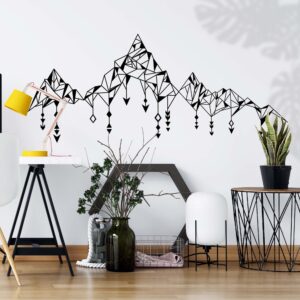 Geometric boho mountain wall decal displayed in a modern nursery