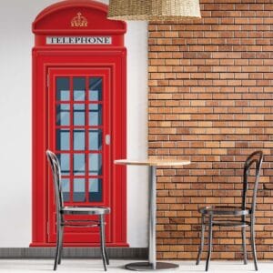 red phone booth decal installed — home office feature wall vintage london